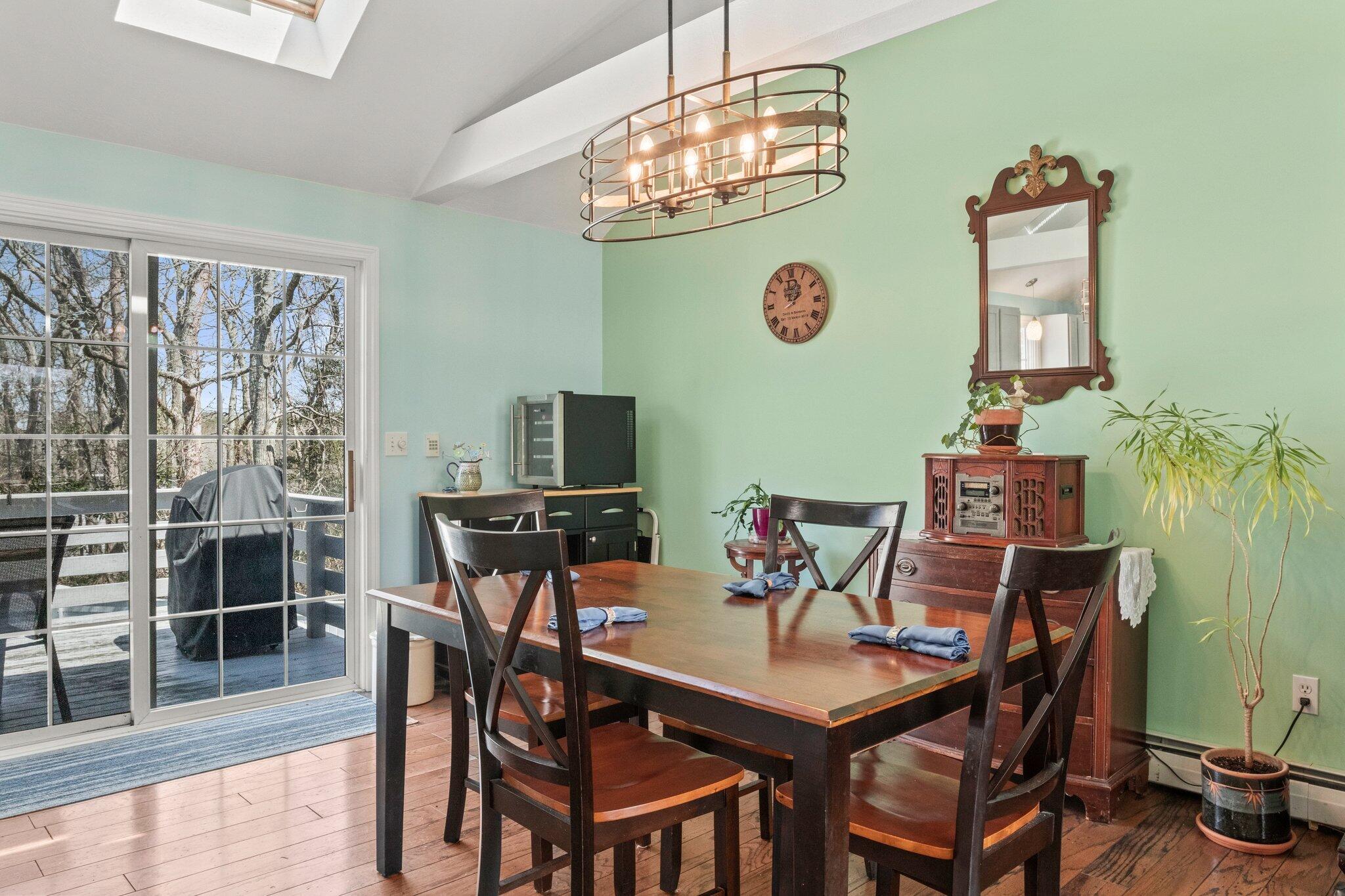 9 Forest Road Forestdale, MA 02644 - Photo 10 of 29 a view of a dining room with furniture and chandelier