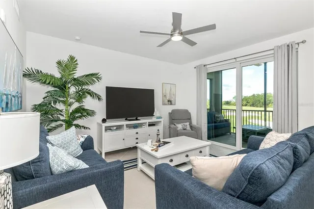 a view of a lake with a houses in the background