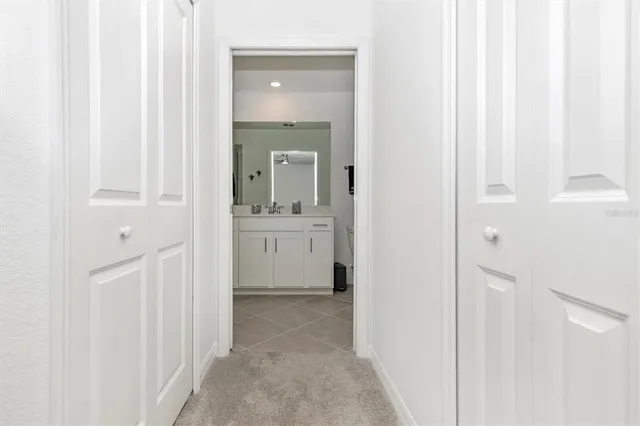 a view of a golf course with an ocean