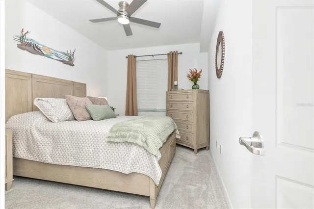 a building outdoor space with patio furniture and potted plants