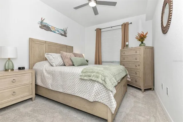 a view of a room with gym equipment and a large window