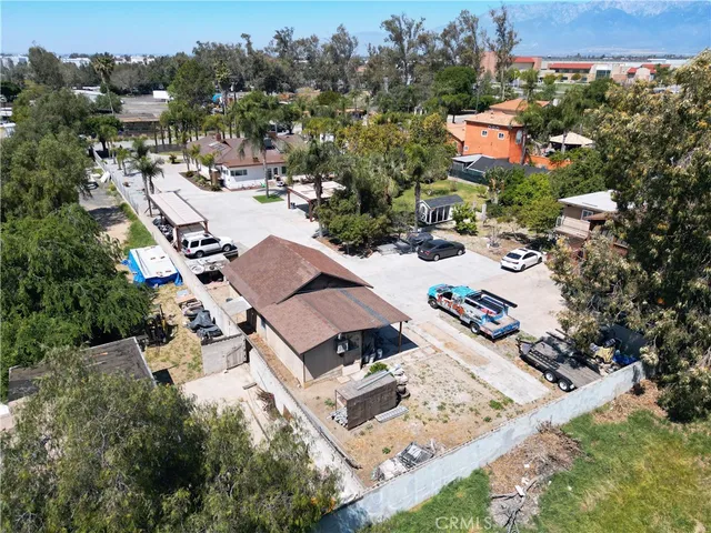 an aerial view of a house with a garden