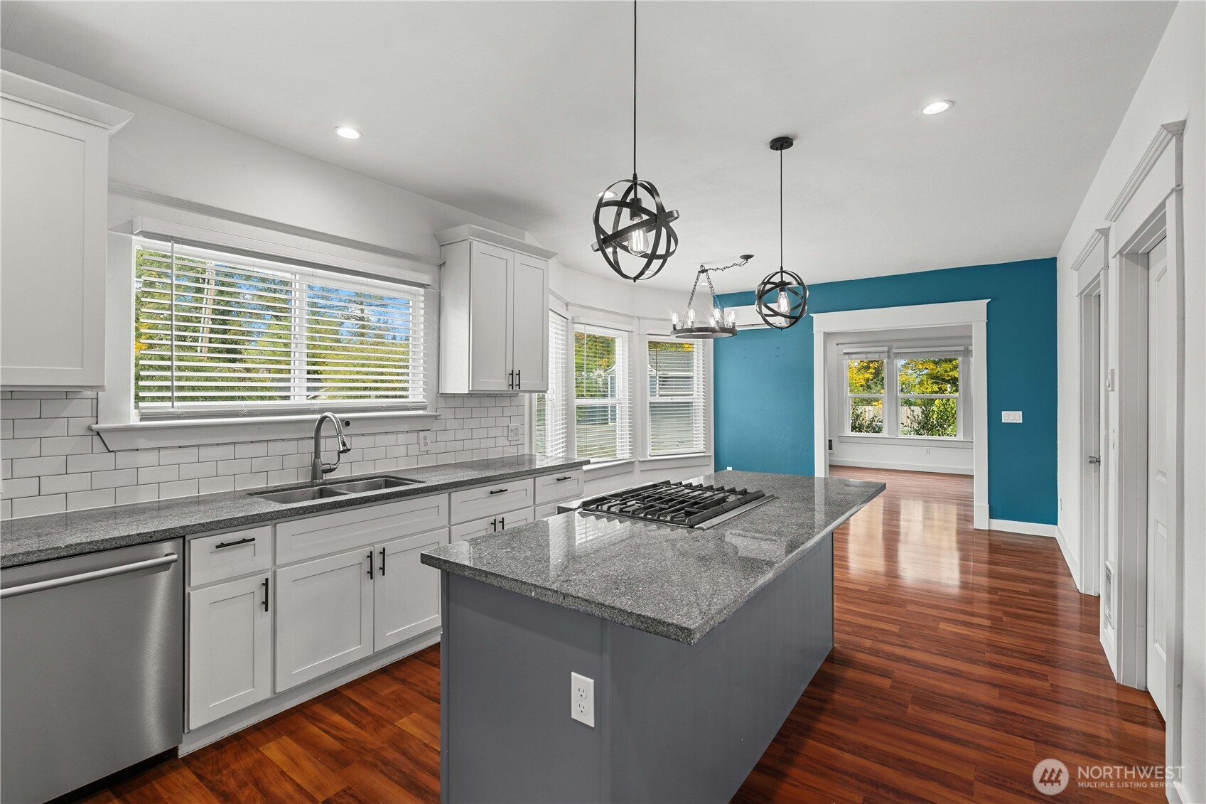 624 West Main Street Sumner, WA 98390 - Photo 12 of 34 a kitchen with sink stove and refrigerator