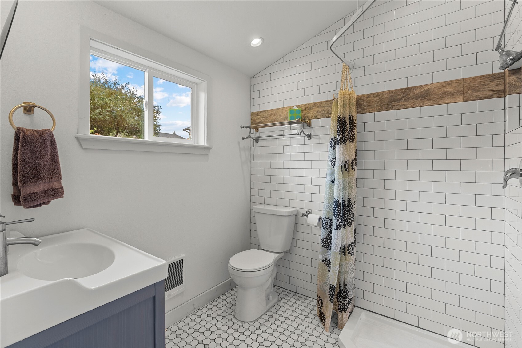 624 West Main Street Sumner, WA 98390 - Photo 16 of 34 a bathroom with a sink toilet and shower