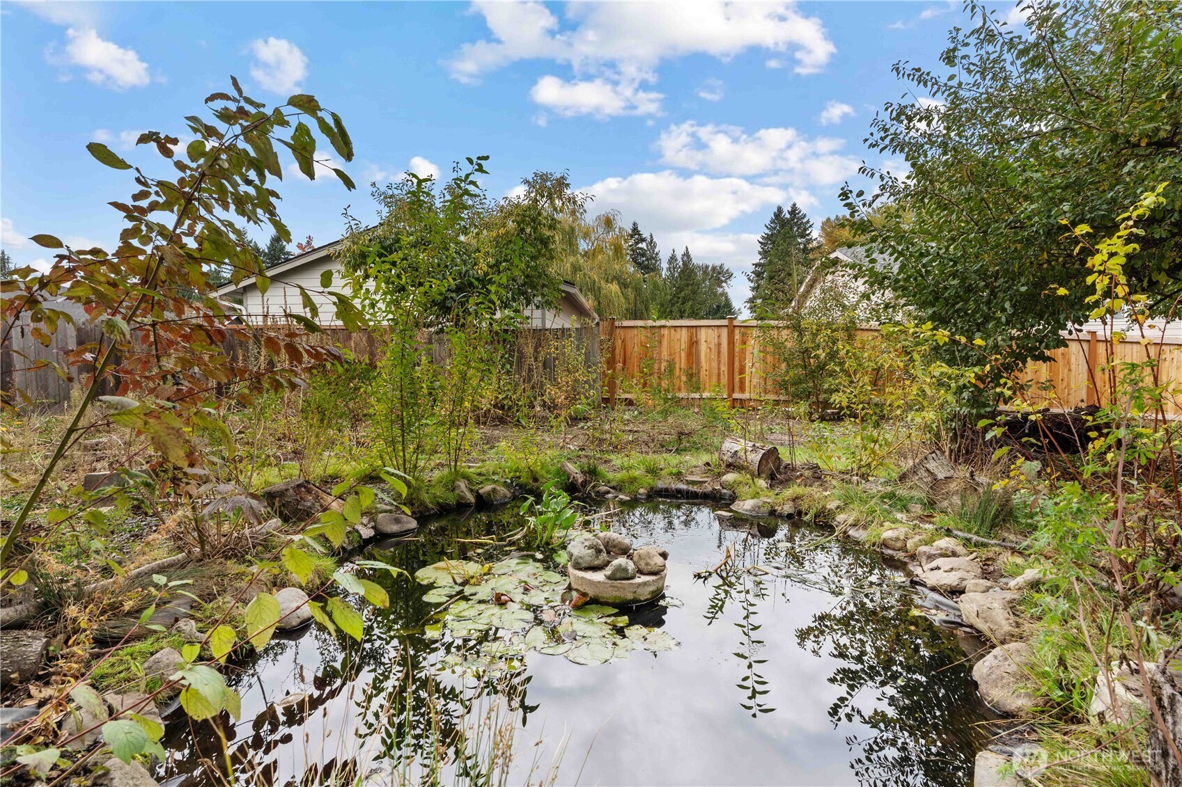 624 West Main Street Sumner, WA 98390 - Photo 23 of 34 a view of swimming pool and mountain in the back