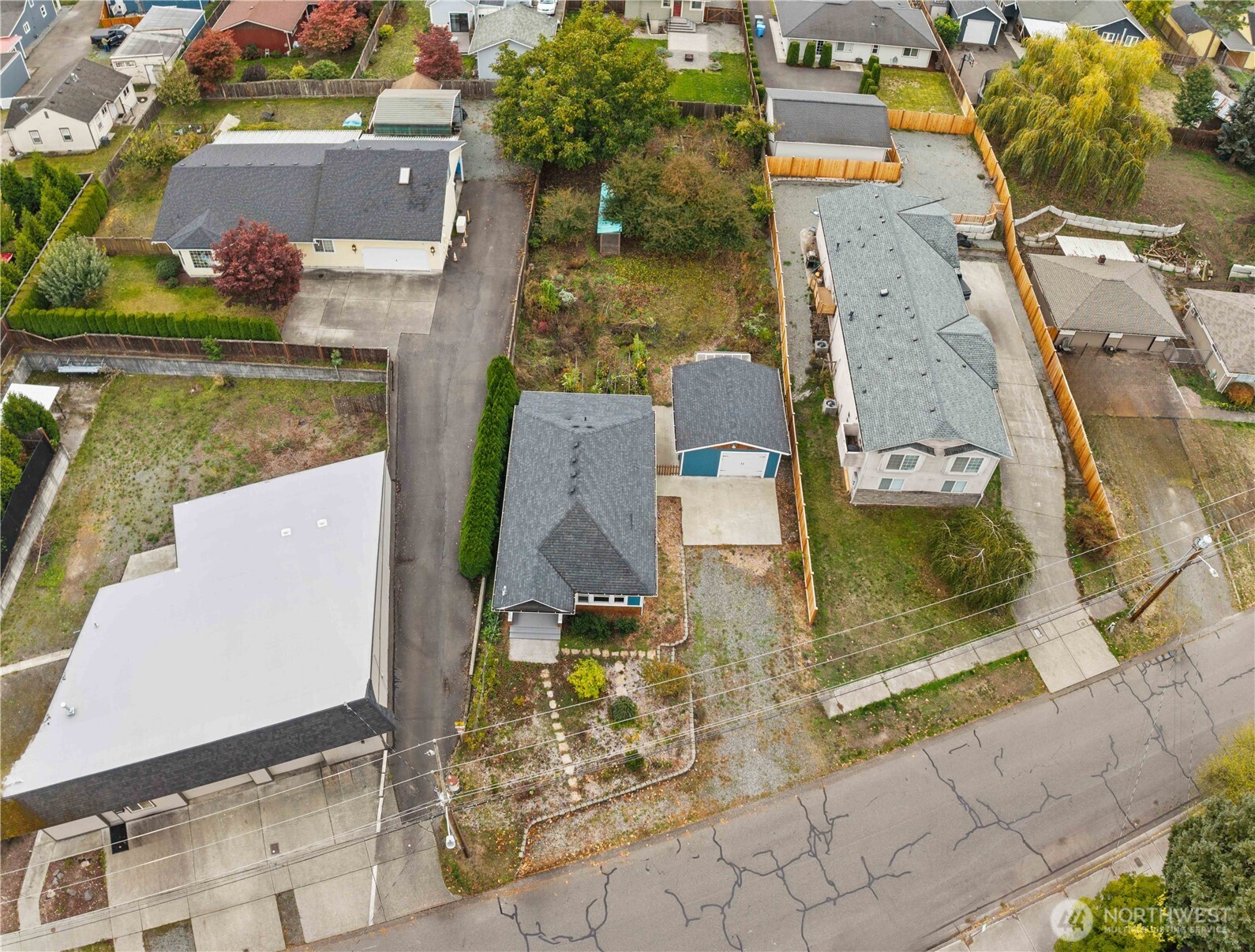 624 West Main Street Sumner, WA 98390 - Photo 34 of 34 an aerial view of residential houses with outdoor space