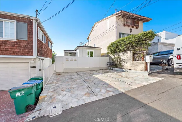 a view of a house with a street