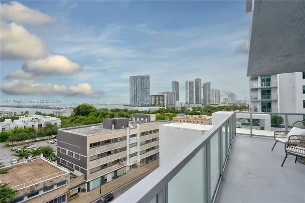 a view of a city with tall buildings