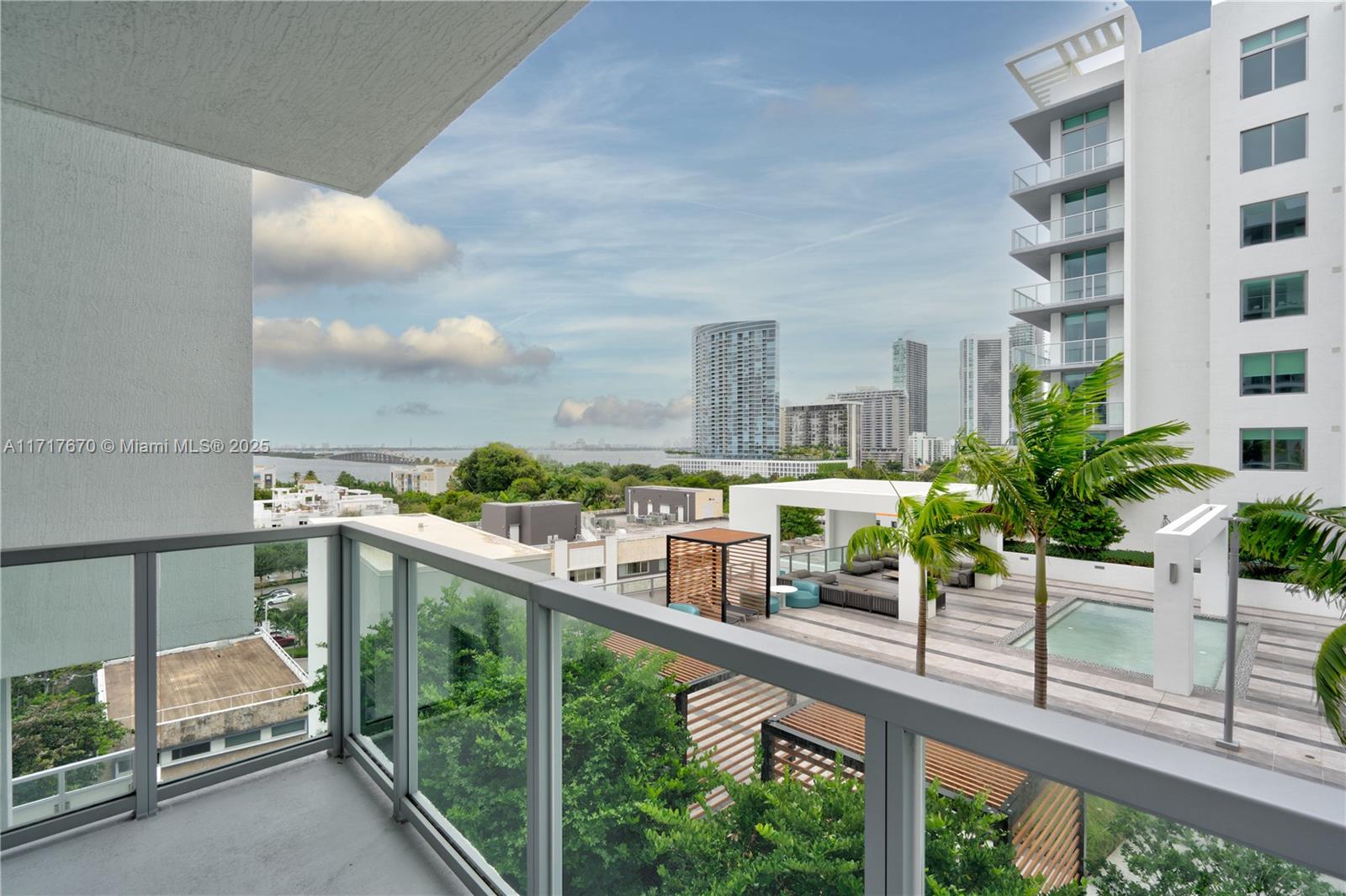 3900 Biscayne Boulevard, Unit N717 Miami, FL 33137 - Photo 8 of 34 a view of a balcony with chairs