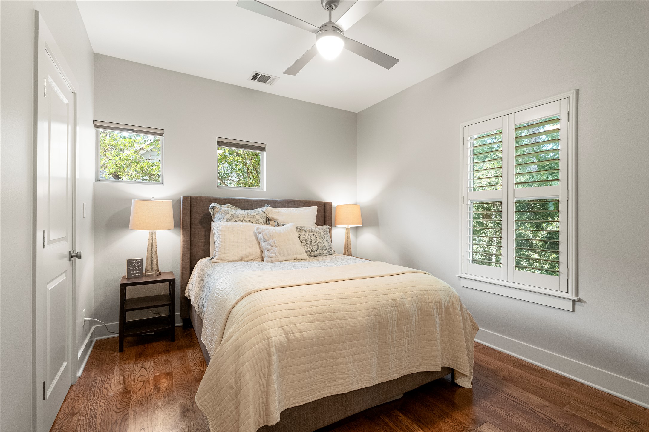 3814 Ridgelea Drive, Unit A Austin, TX 78731 - Photo 26 of 30 a bedroom with a bed and a window
