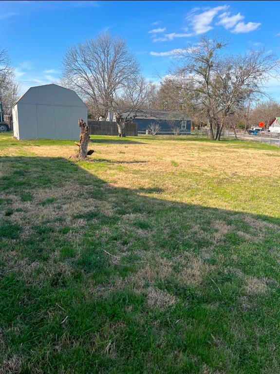 Tbd East Hubbard Road Josephine, TX 75173 - Photo 4 of 6 a view of a swimming pool with an outdoor space and seating area