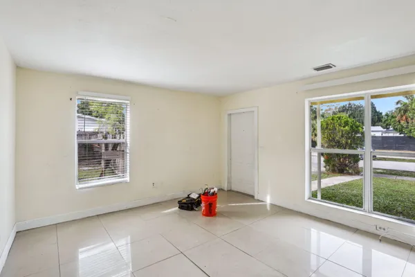 a view of a room with window lake and mountain view