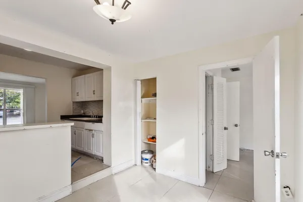 a kitchen with stainless steel appliances a stove and a refrigerator