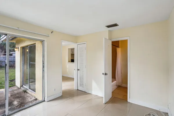 an empty room with windows