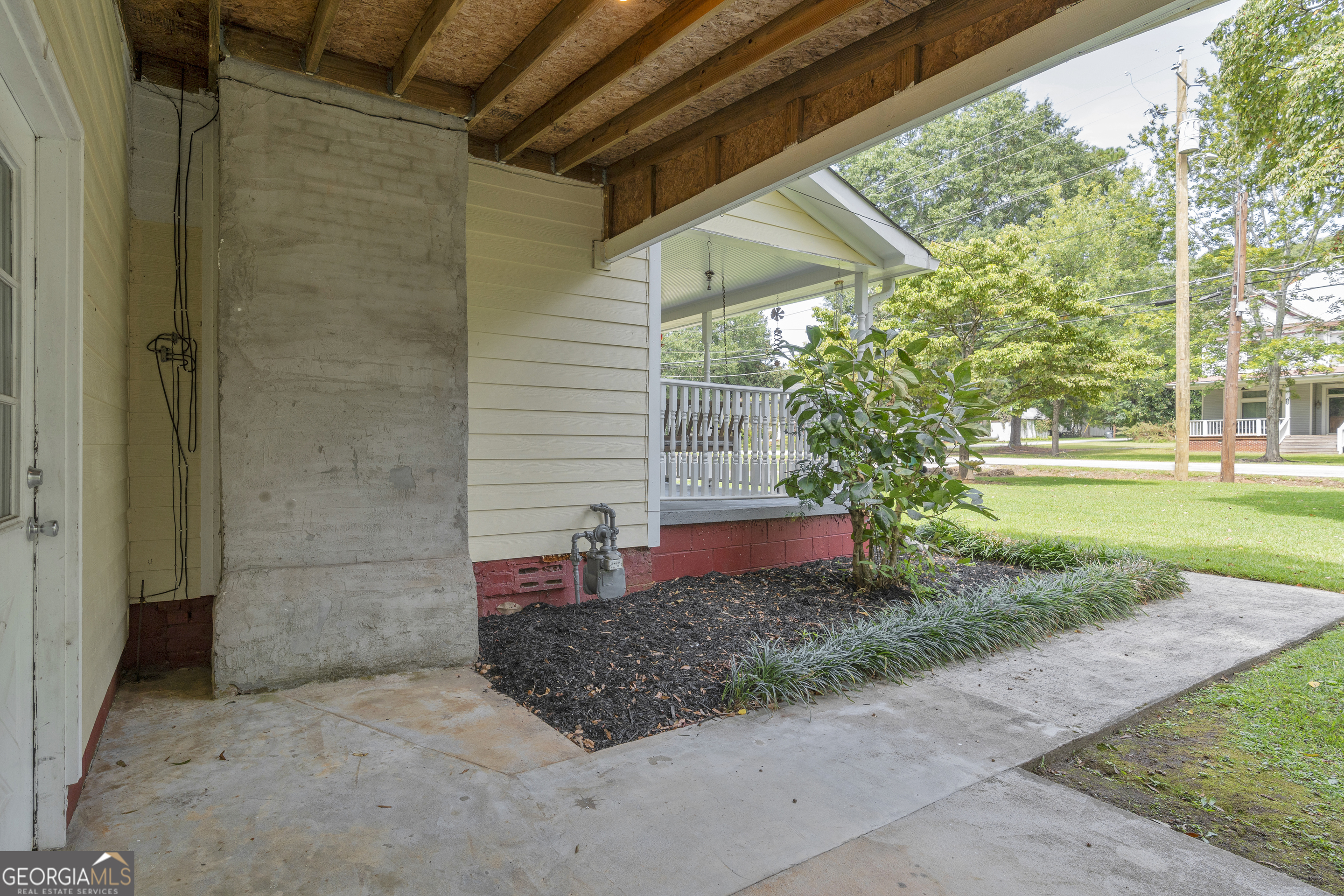 878 Jackson Street Locust Grove, GA 30248 - Photo 11 of 65 a front view of a house with a yard