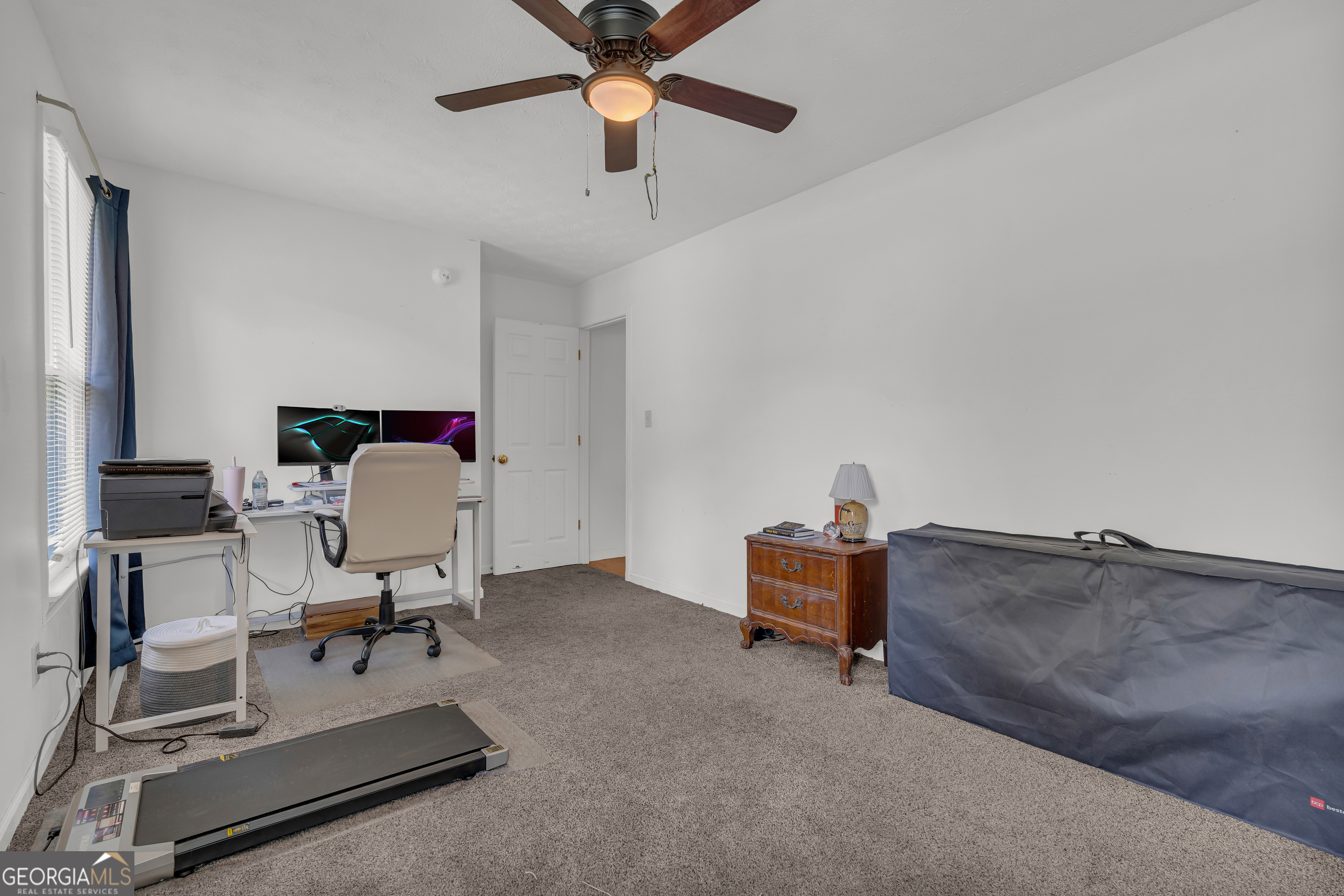 878 Jackson Street Locust Grove, GA 30248 - Photo 44 of 65 a work room with furniture