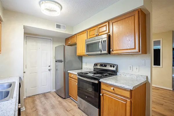 a room with a sink and a window