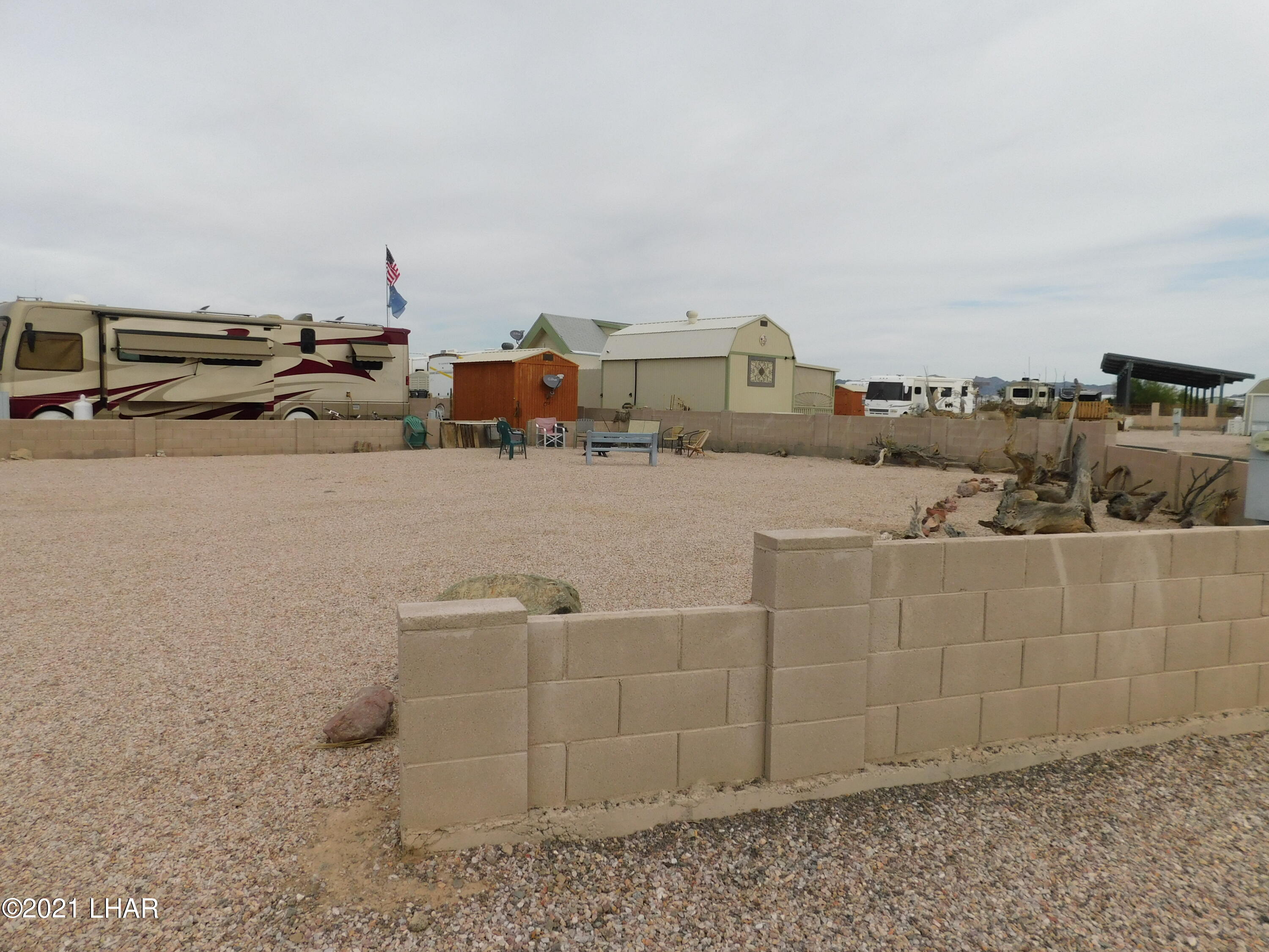 55 Sagebrush Road Quartzsite, AZ 85346 - Photo 2 of 5 Block fence on 3 sided.