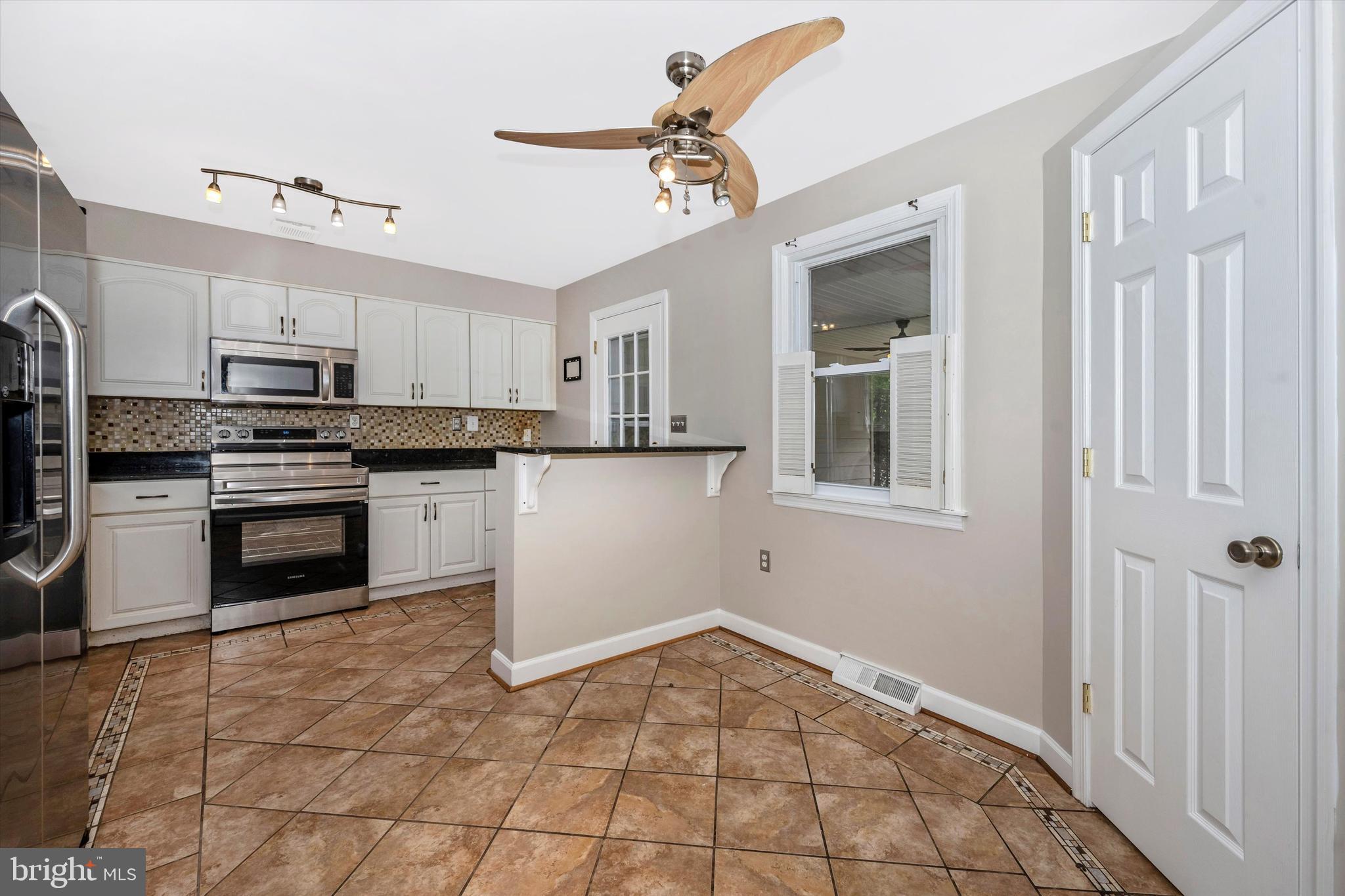 1724 Bollinger Road Westminster, MD 21157 - Photo 15 of 71 Kitchen with front entrance and pantry