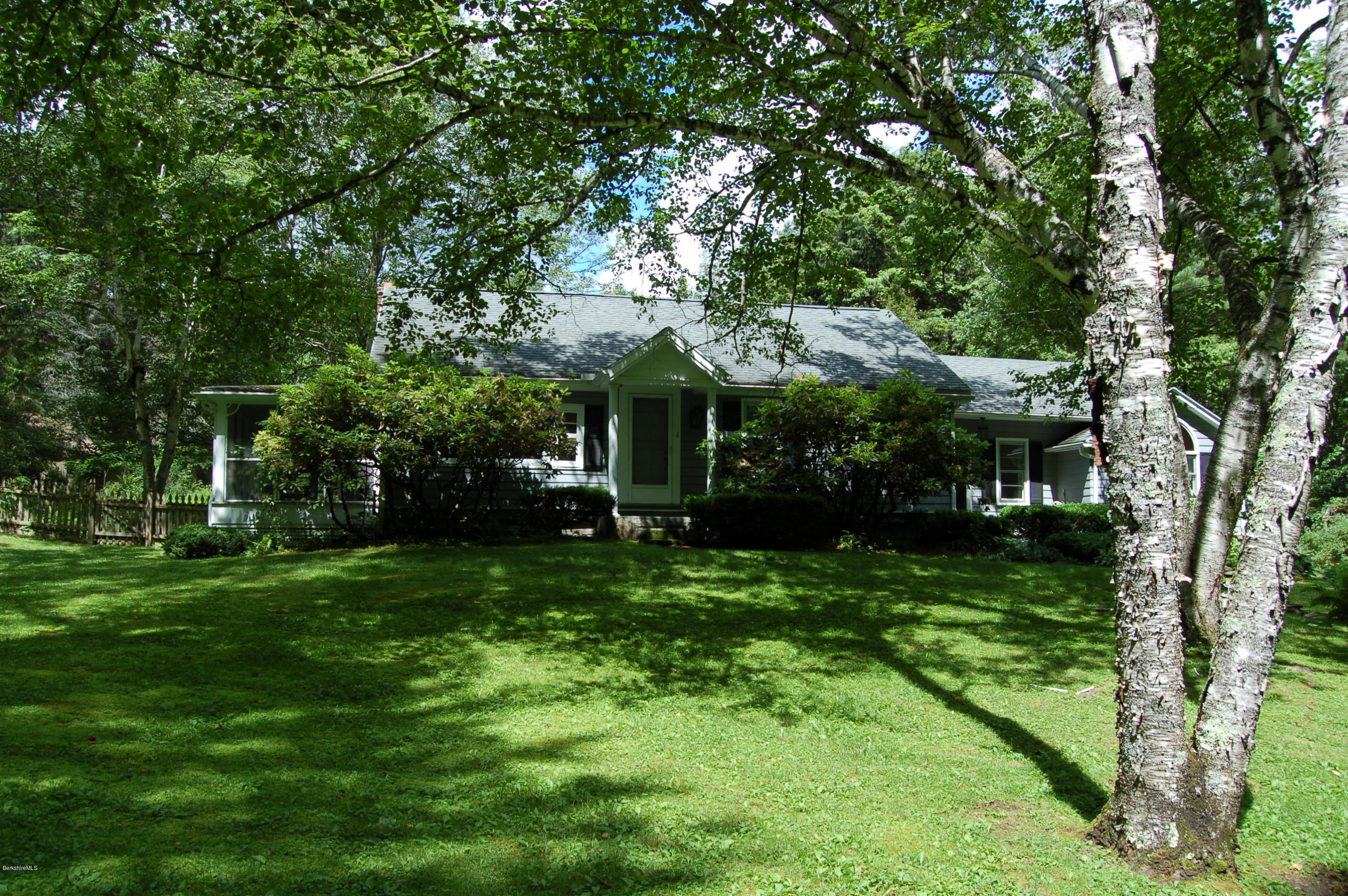 4 West Dale Road Stockbridge, MA 01229 - Photo 2 of 16 a view of a house with a big yard plants and large trees