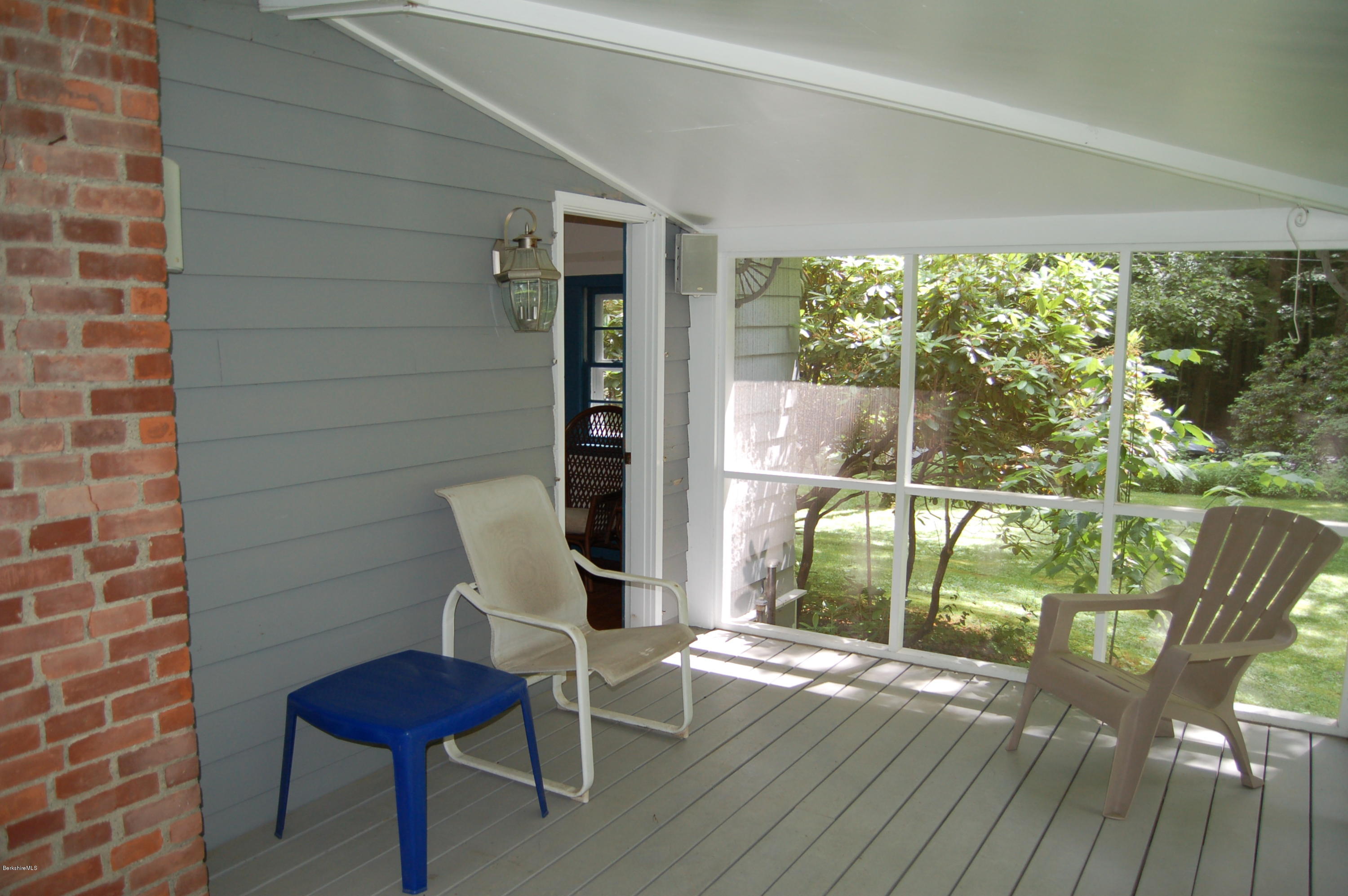 4 West Dale Road Stockbridge, MA 01229 - Photo 12 of 16 a view of balcony with wooden floor and outdoor seating