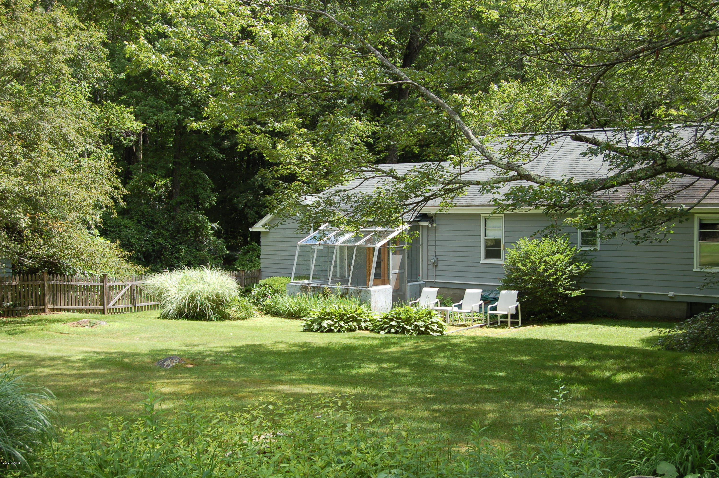 4 West Dale Road Stockbridge, MA 01229 - Photo 15 of 16 a front view of a house with garden