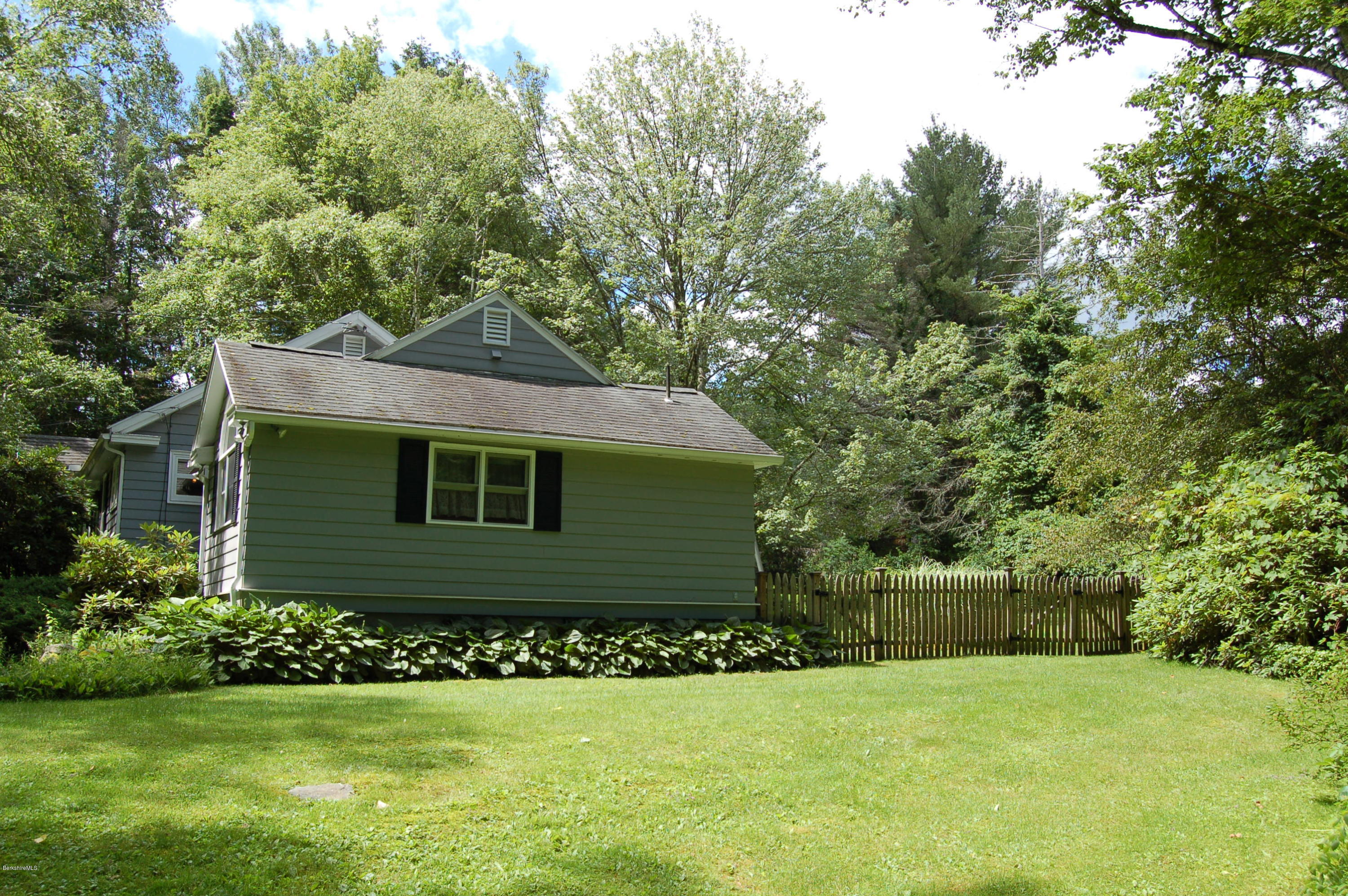 4 West Dale Road Stockbridge, MA 01229 - Photo 16 of 16 a front view of a house with a garden