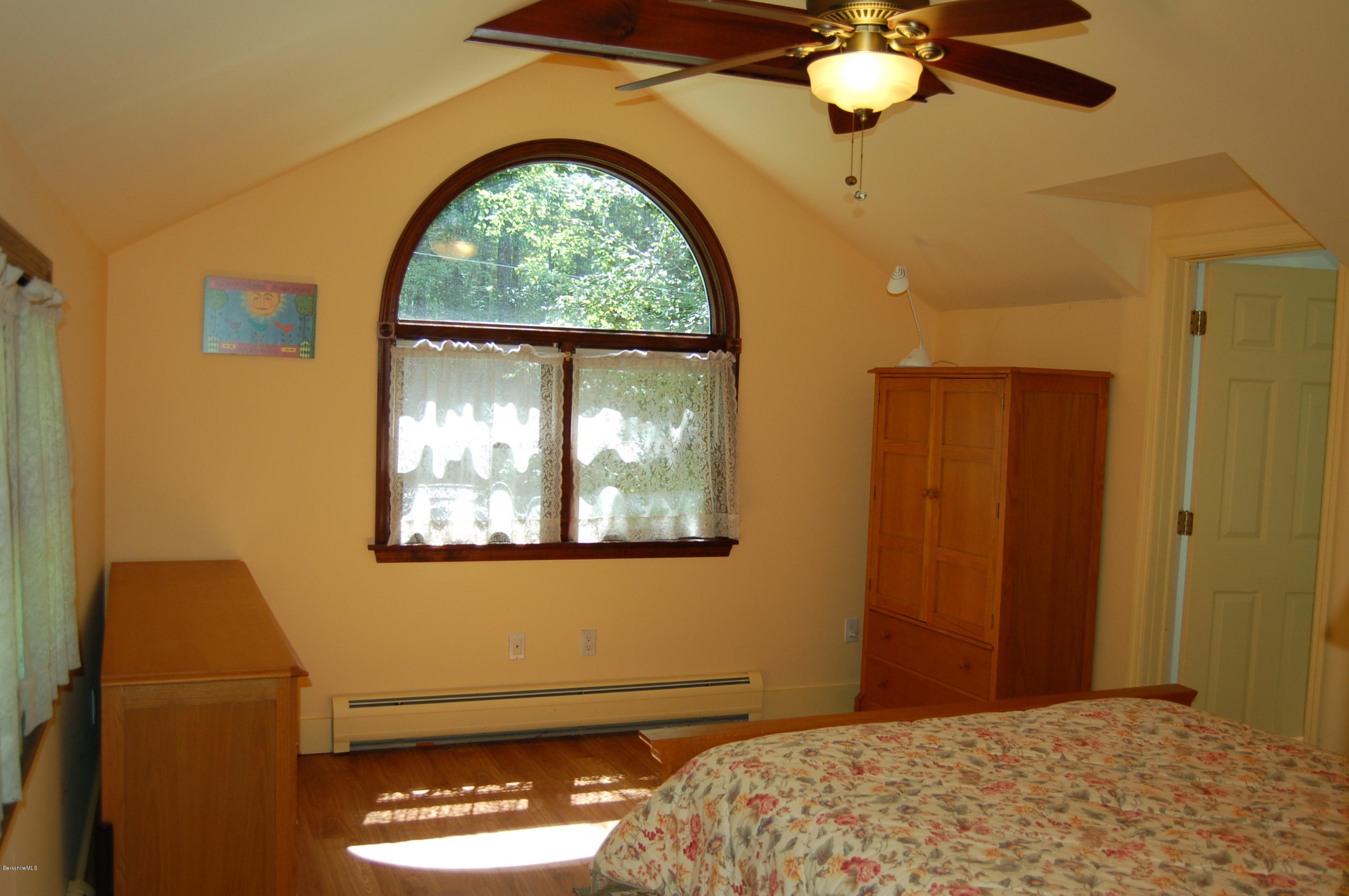 4 West Dale Road Stockbridge, MA 01229 - Photo 9 of 16 a bedroom with a bed and a window