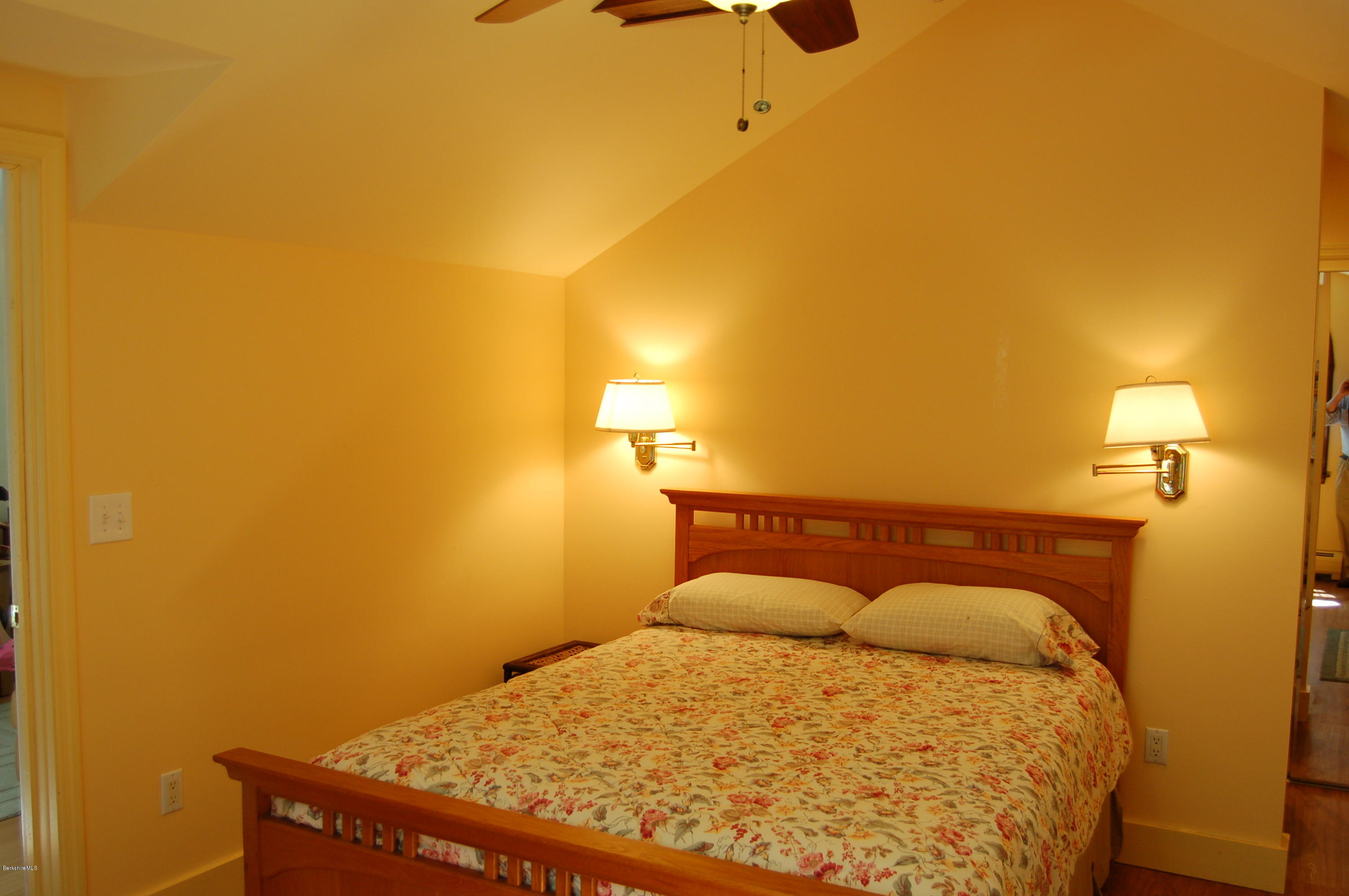 4 West Dale Road Stockbridge, MA 01229 - Photo 10 of 16 a bedroom with a bed and a night stand