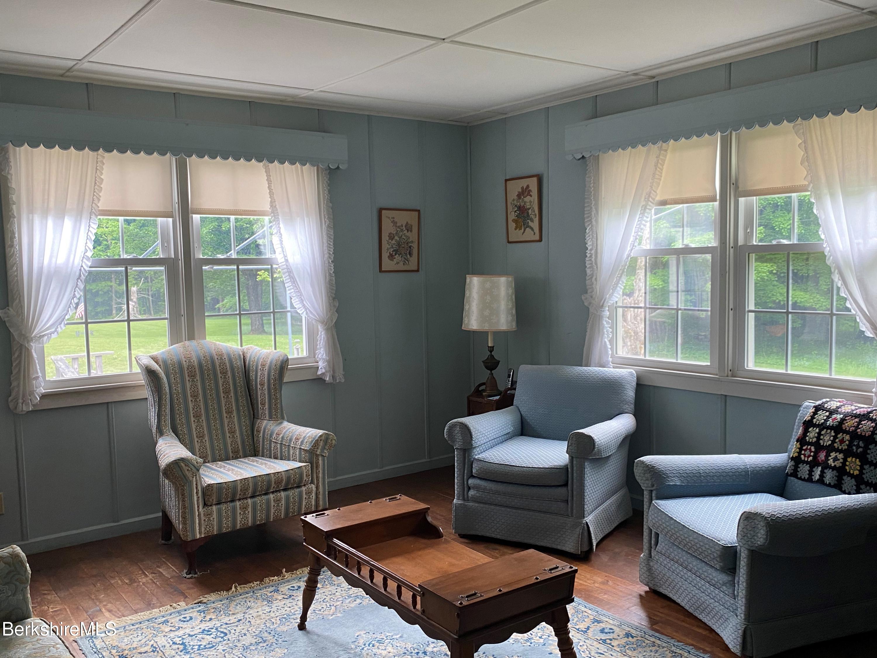 983 State Road Richmond, MA 01254 - Photo 18 of 47 a living room with furniture and a window