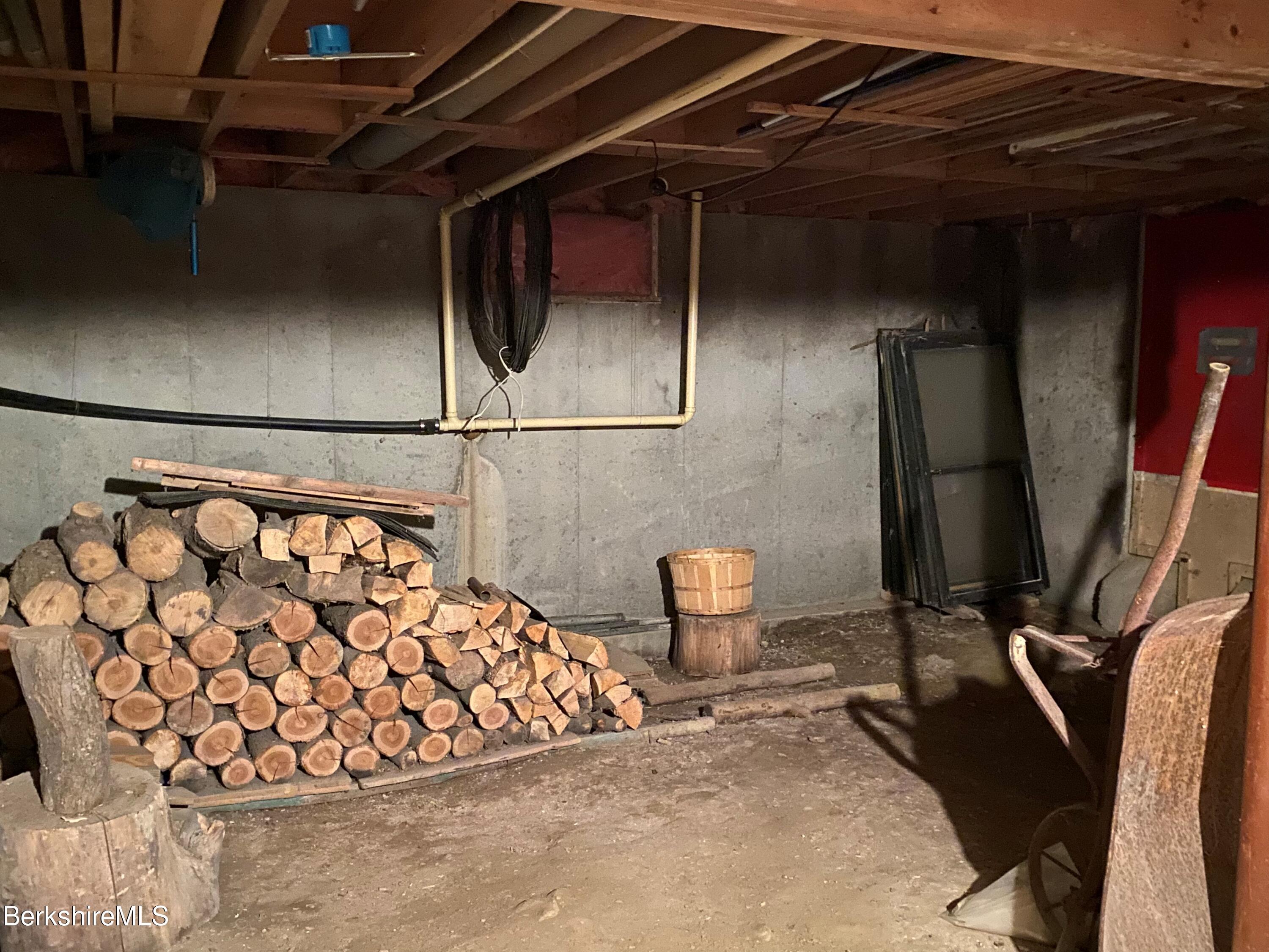 983 State Road Richmond, MA 01254 - Photo 40 of 47 a view of a storage room with wooden floor