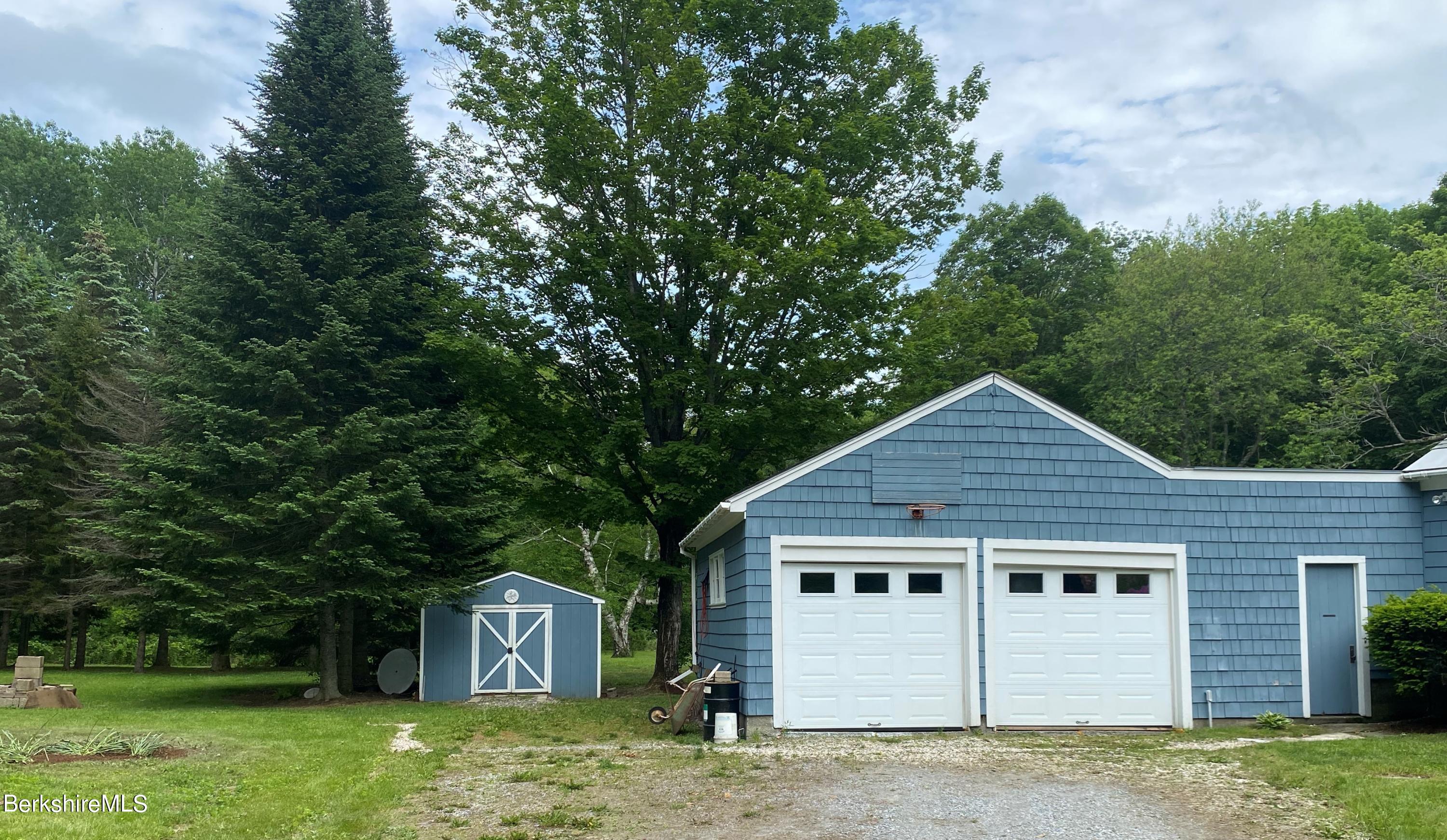 983 State Road Richmond, MA 01254 - Photo 6 of 47 a front view of a house with a yard