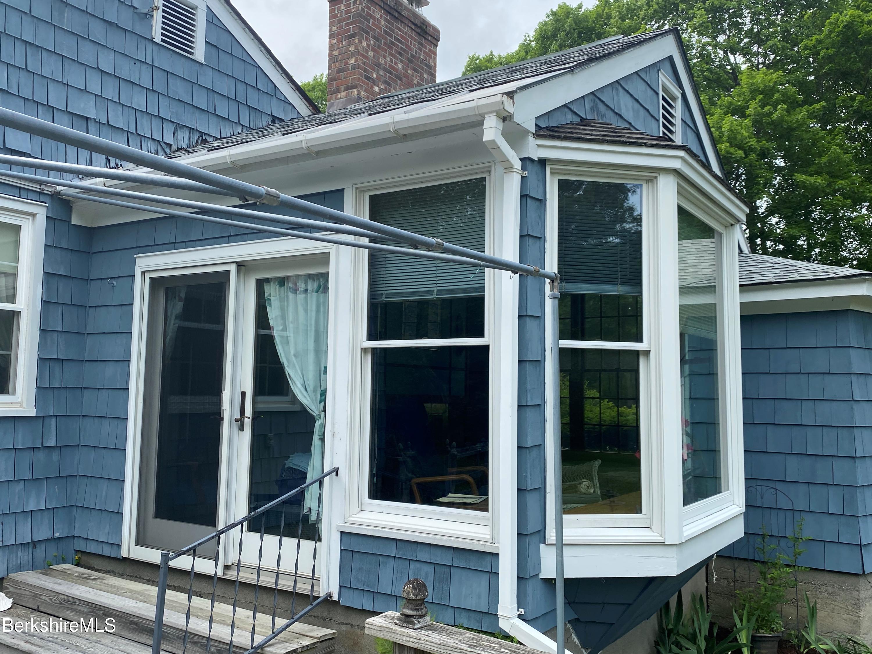 983 State Road Richmond, MA 01254 - Photo 9 of 47 a view of a door of the house