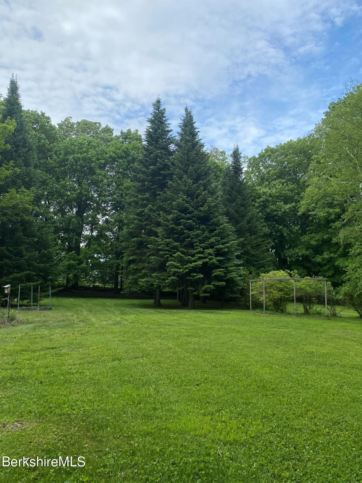 983 State Road Richmond, MA 01254 - Photo 10 of 47 a view of a green field