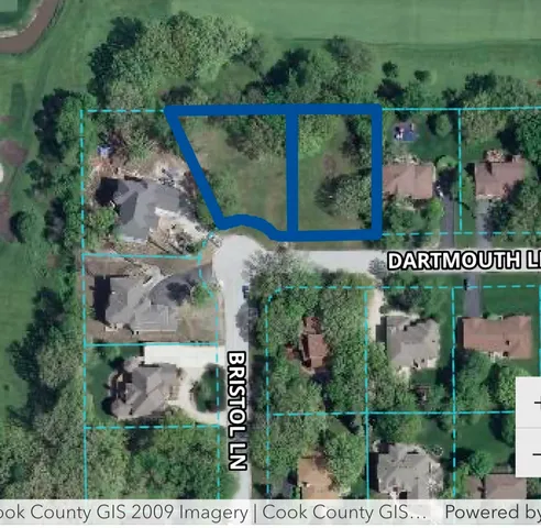 an aerial view of a house outdoor space and street view