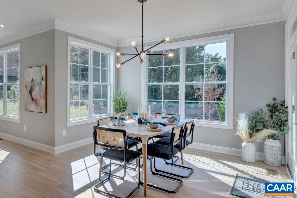 25 Wexford Ridge Road Ruckersville, VA 22968 - Photo 15 of 41 a dining room with furniture window and wooden floor