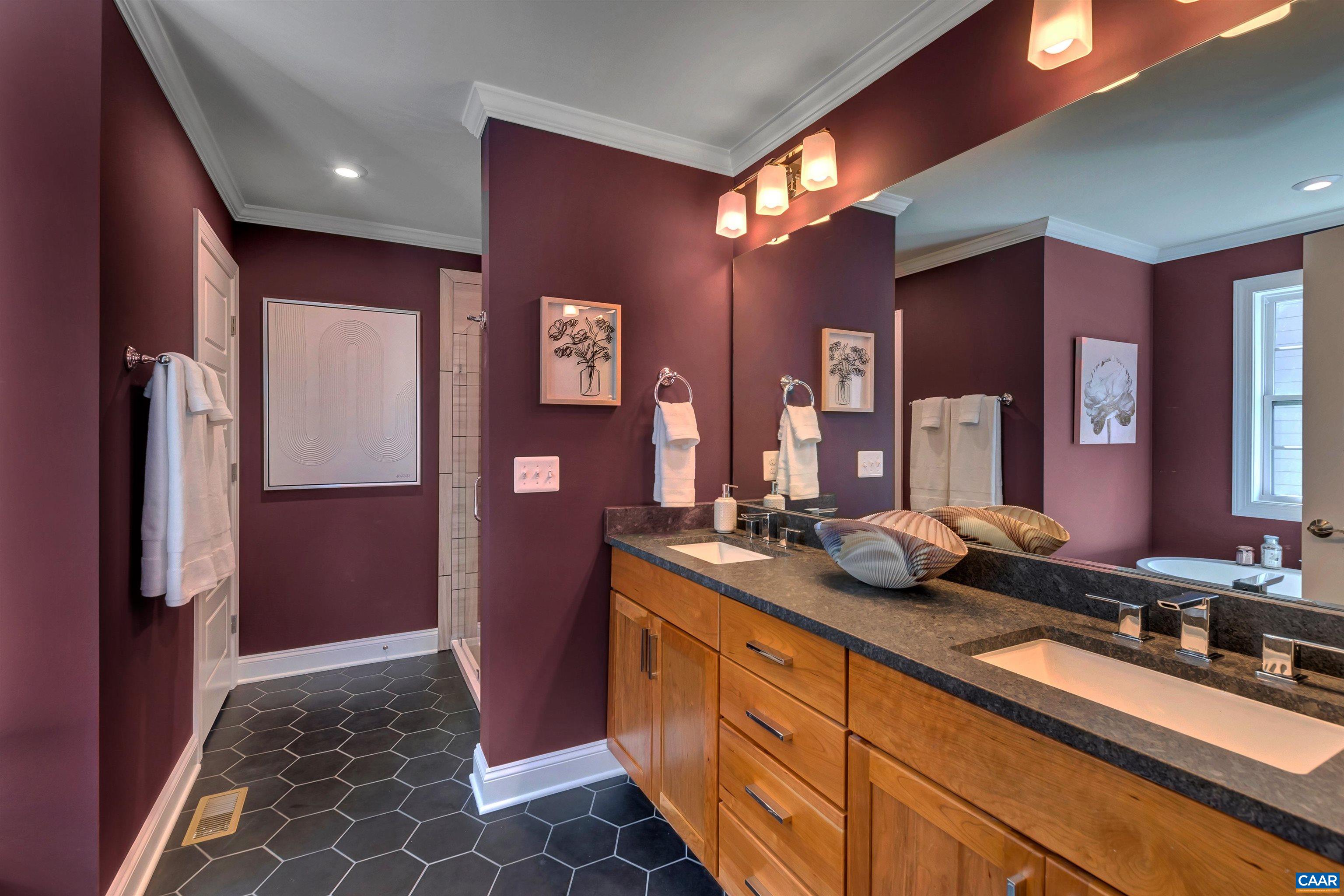 25 Wexford Ridge Road Ruckersville, VA 22968 - Photo 27 of 41 a spacious bathroom with a mirror sink and shower