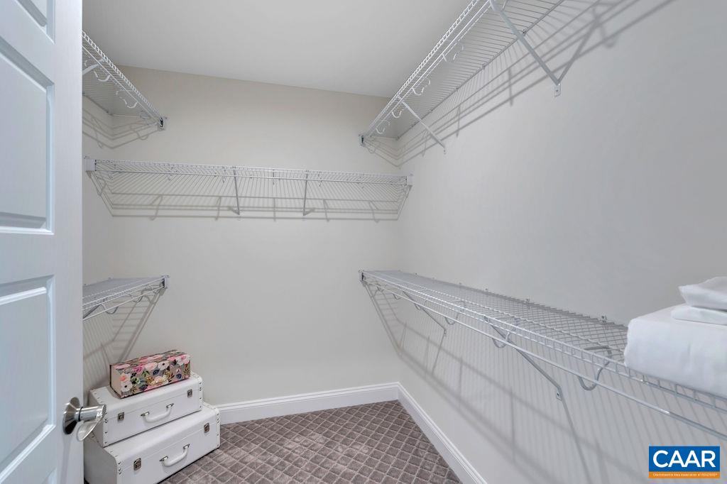 25 Wexford Ridge Road Ruckersville, VA 22968 - Photo 30 of 41 a view of storage and utility room with racks on the wall