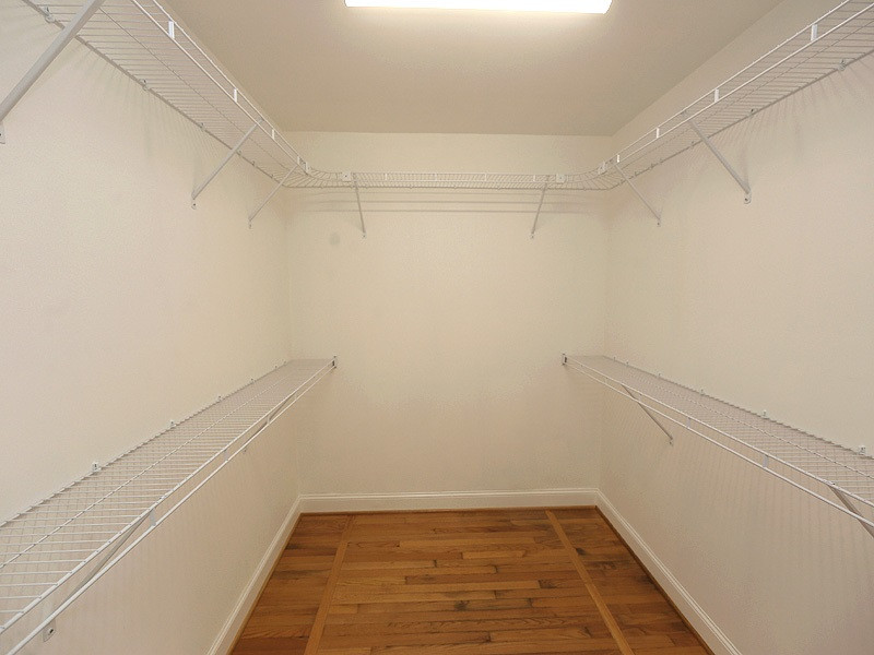 217 Chambers Road Rougemont, NC 27572 - Photo 10 of 19 Hardwoods throughout master closet and space saving pocket door. Master closet