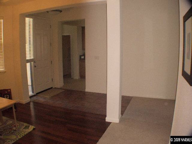 10654 Autumn Walk Lane Reno, NV 89521 - Photo 4 of 7 a view of hallway with wooden floor