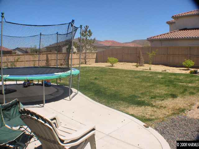10654 Autumn Walk Lane Reno, NV 89521 - Photo 7 of 7 a view of a backyard