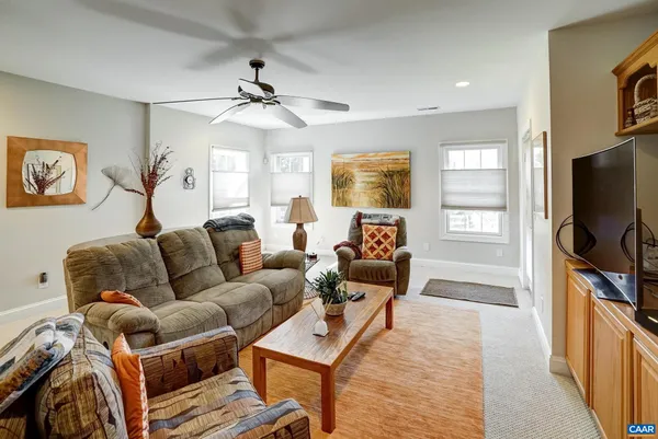 a view of a chair and table on the deck