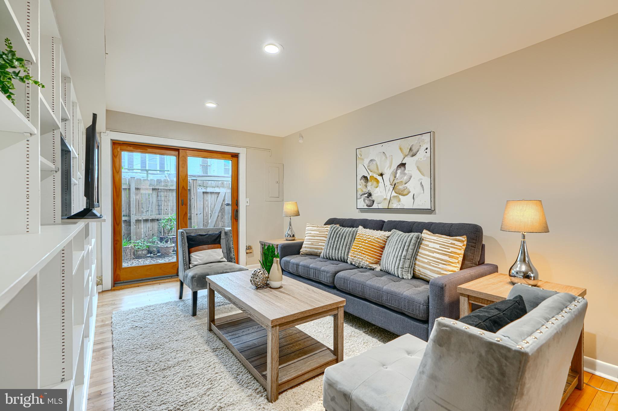 417 Grindall Street Baltimore, MD 21230 - Photo 15 of 37 a living room with furniture and a lamp
