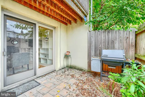 a backyard of a house with seating space