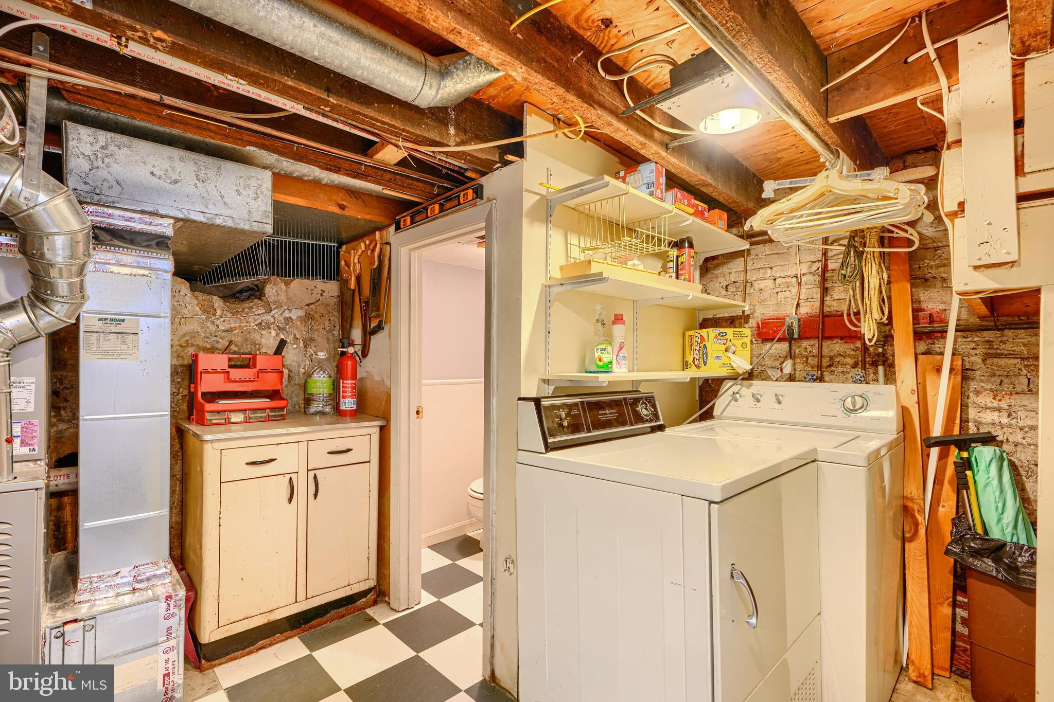 417 Grindall Street Baltimore, MD 21230 - Photo 34 of 37 a utility room with dryer and washer