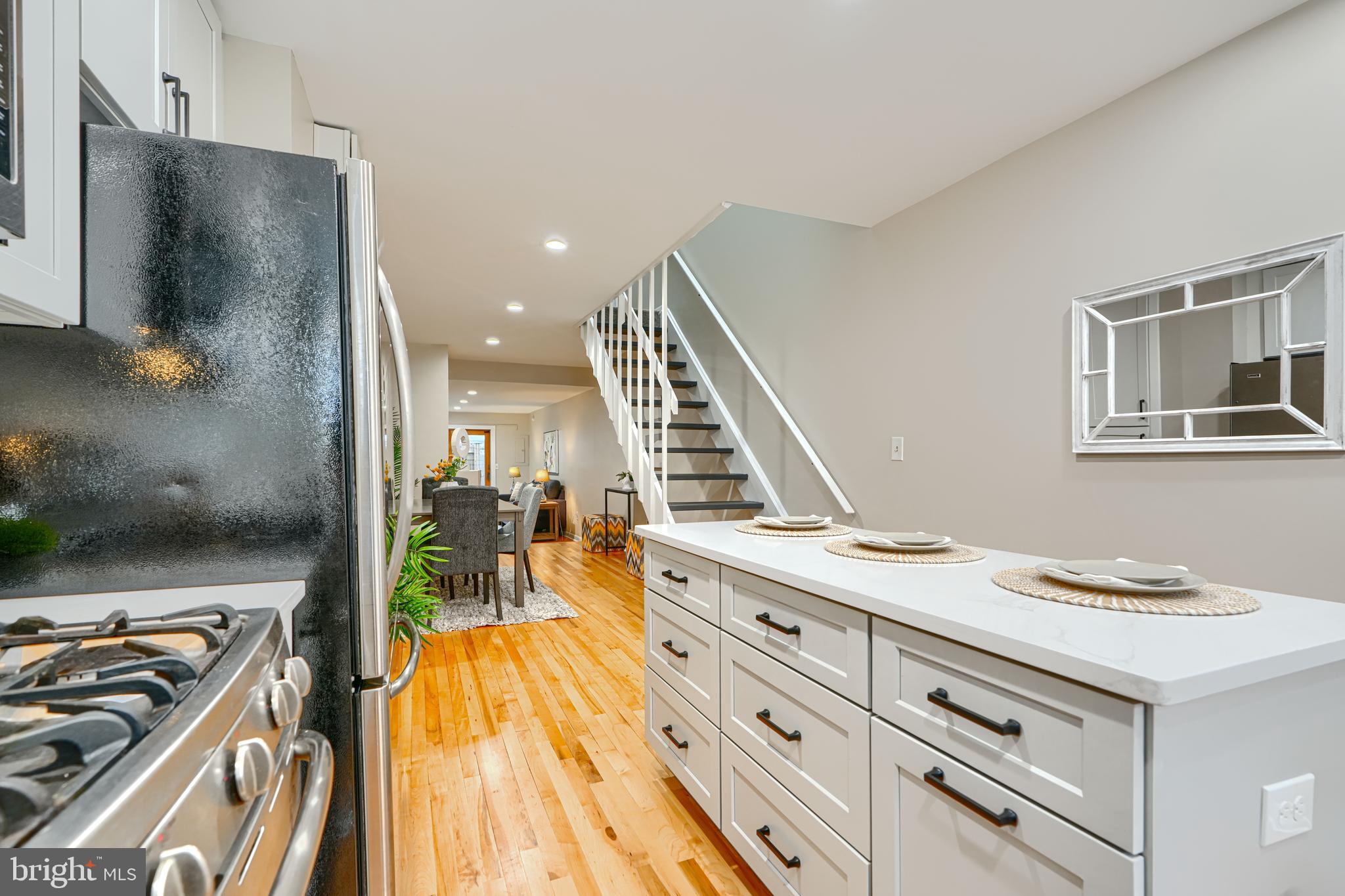 417 Grindall Street Baltimore, MD 21230 - Photo 6 of 37 a view of living room with furniture and flat screen tv