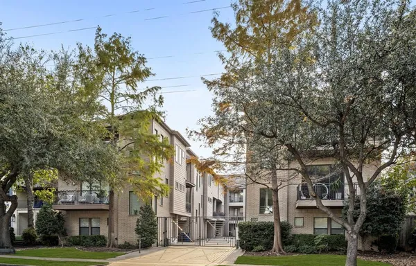 a view of a street in front of a building