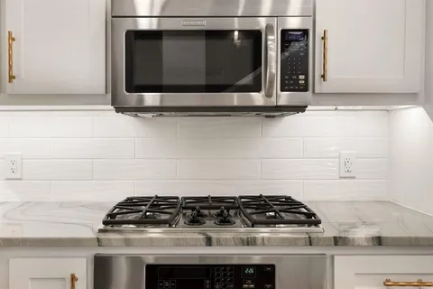 a view of a balcony with wooden floor