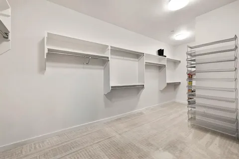 a aerial view of a house with iron stairs