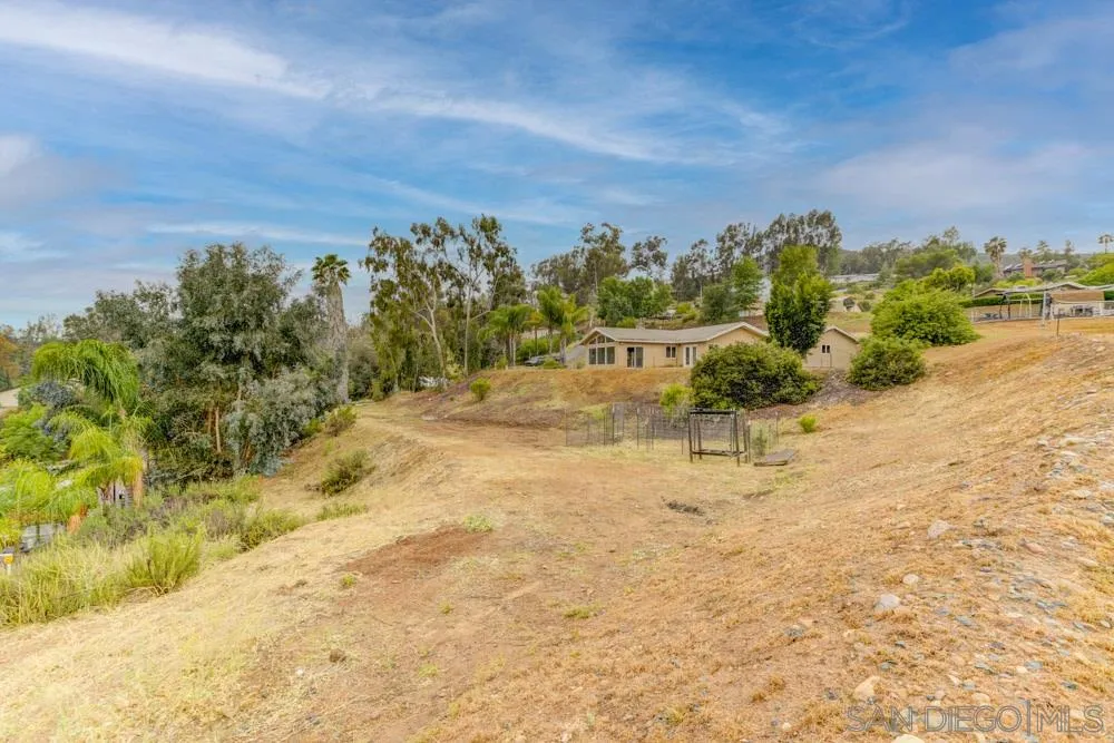 11949 Rocoso Road Lakeside, CA 92040 - Photo 23 of 27 a view of a yard with an trees